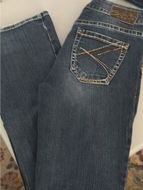 Silver Jeans dark indigo denim with white stitching Ultra Low 2010